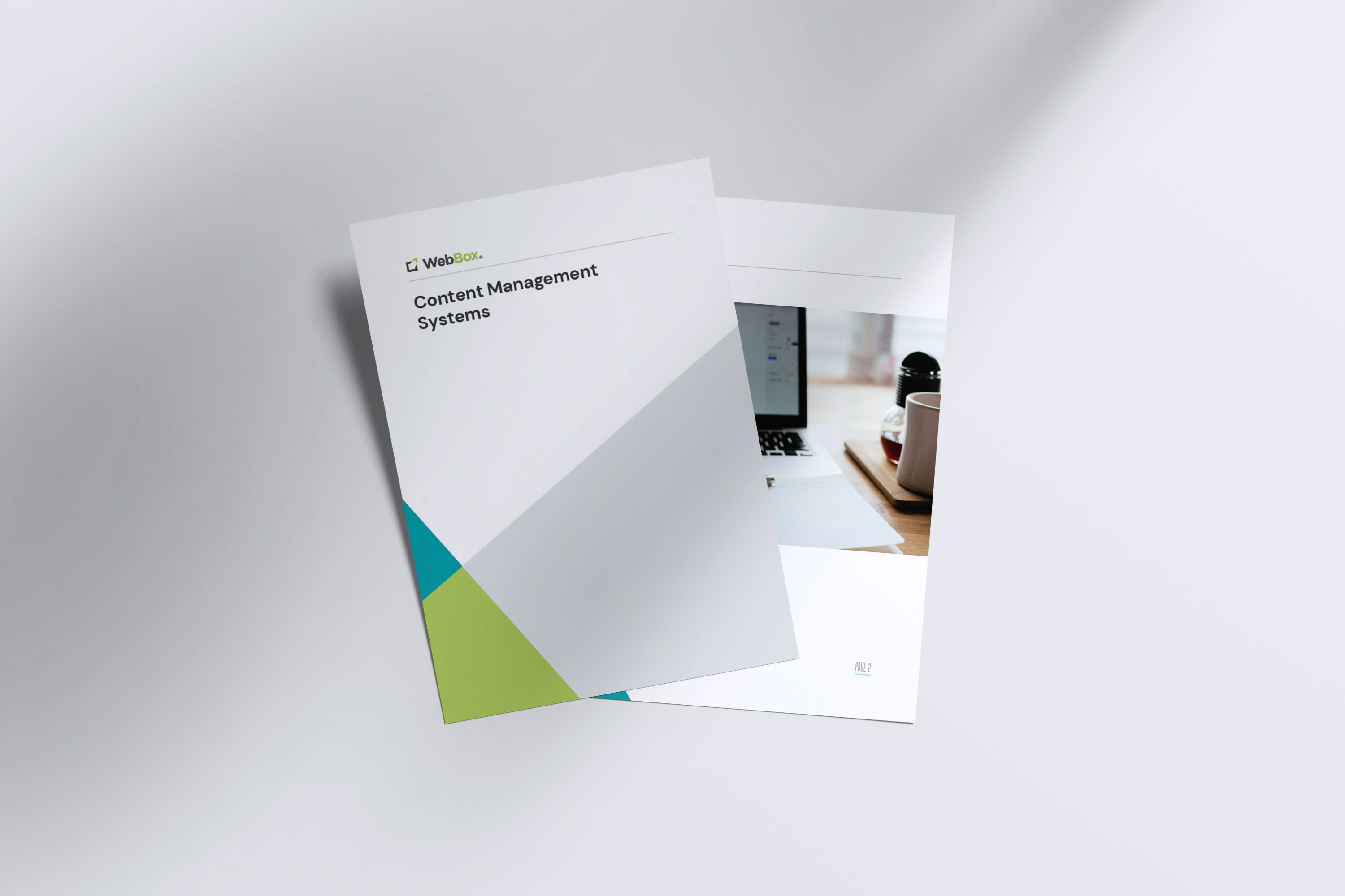 Two brochures from WebBox about content management systems, one slightly covering the other, placed on a white surface.