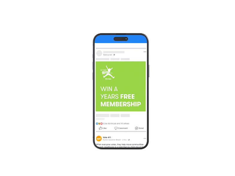 An image of a smartphone displaying a social media post from a gym advertising a chance to win a year's free membership. The background of the post is green with white text.