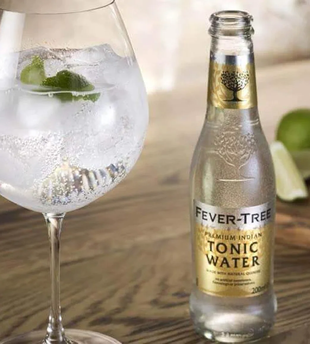 Bottle of Fever Tree alongside iced drink