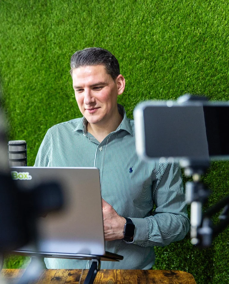 Man recording and presenting a webinar